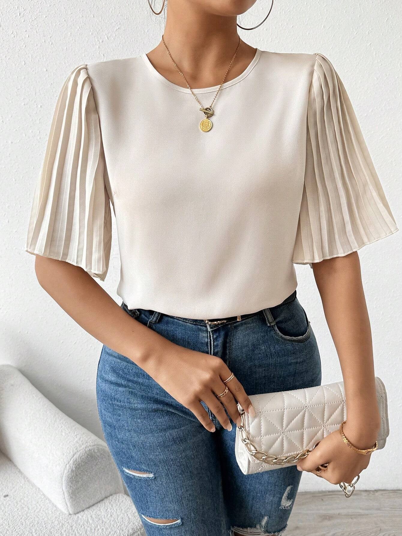 Blouse avec manches plissées et col rond