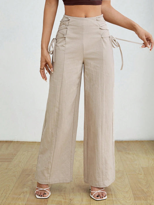 Pantalon élégant avec taille haute et cordons