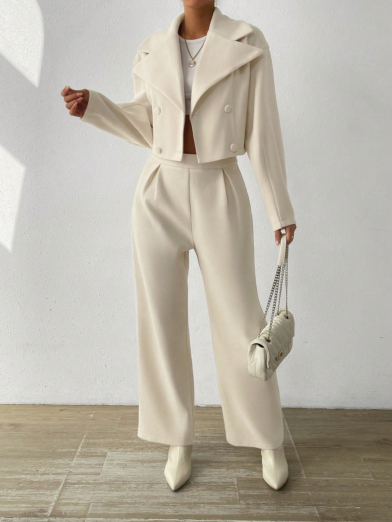 Ensemble manteau court et pantalon taille haute