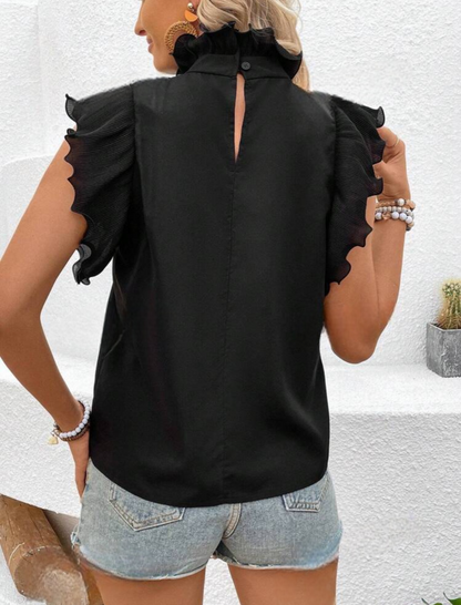 Blouse élégante avec volants