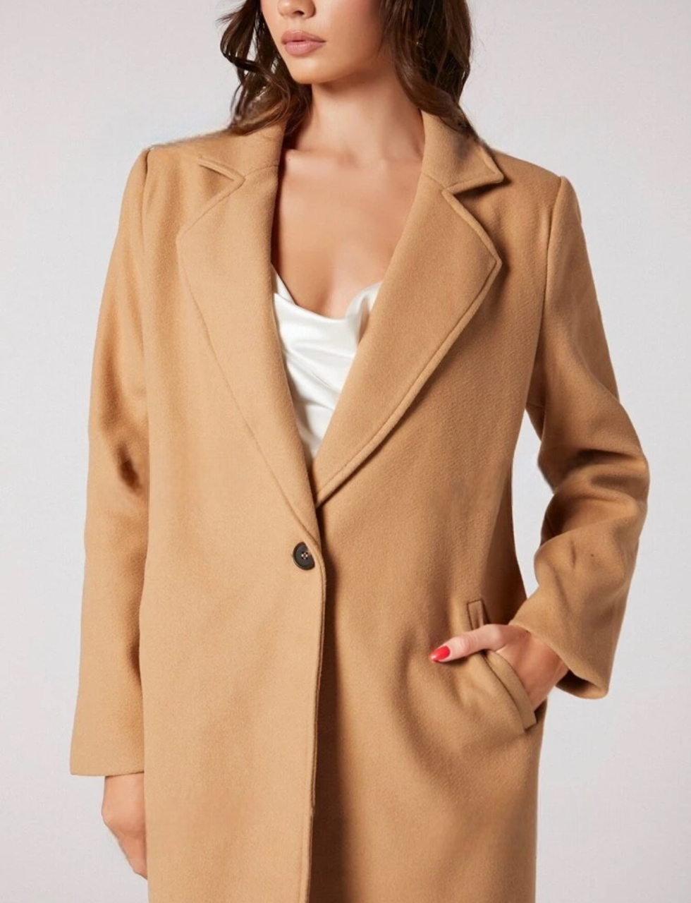 Manteau élégant avec doublure et un bouton