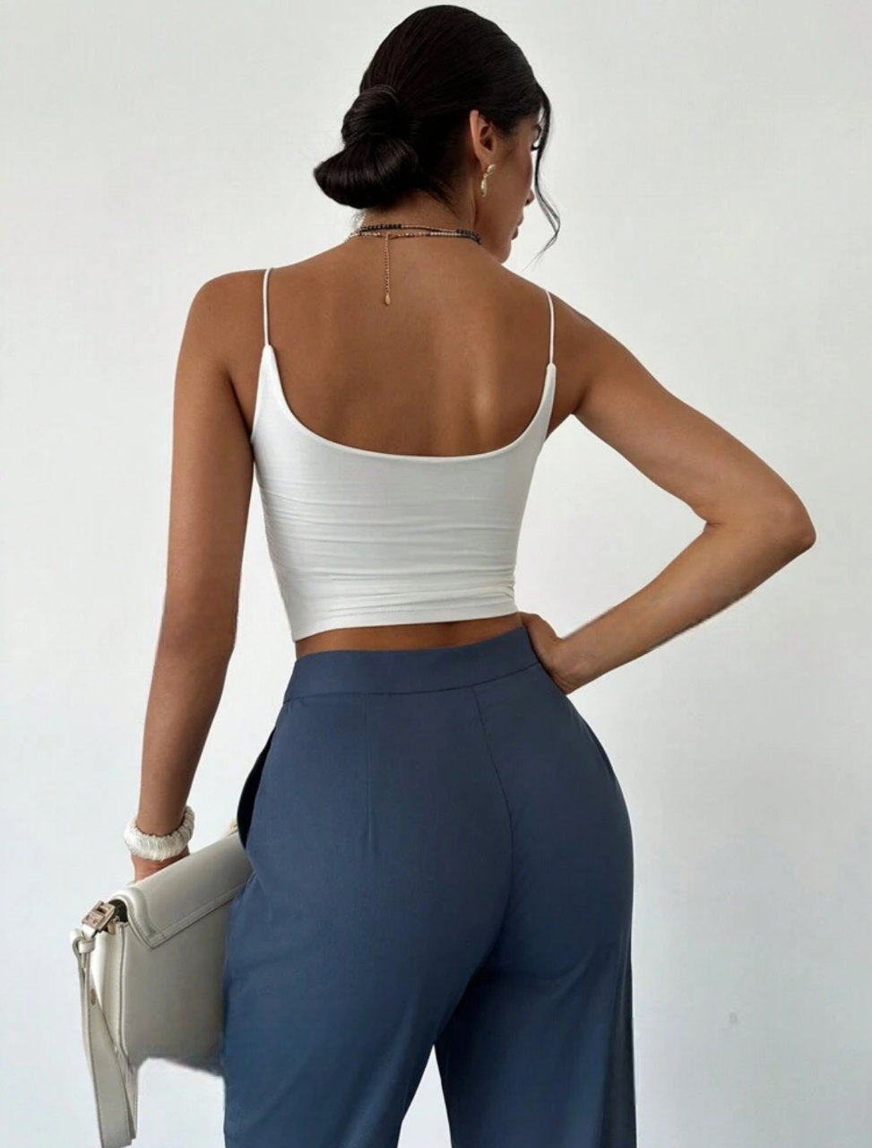 Pantalon élégant avec taille haute et poches