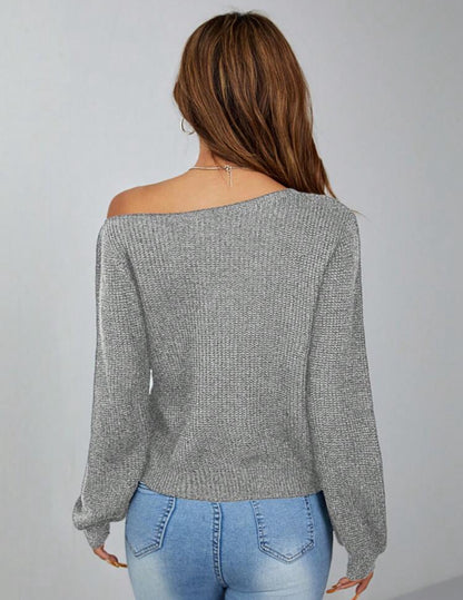 Pull élégant avec épaules asymétriques