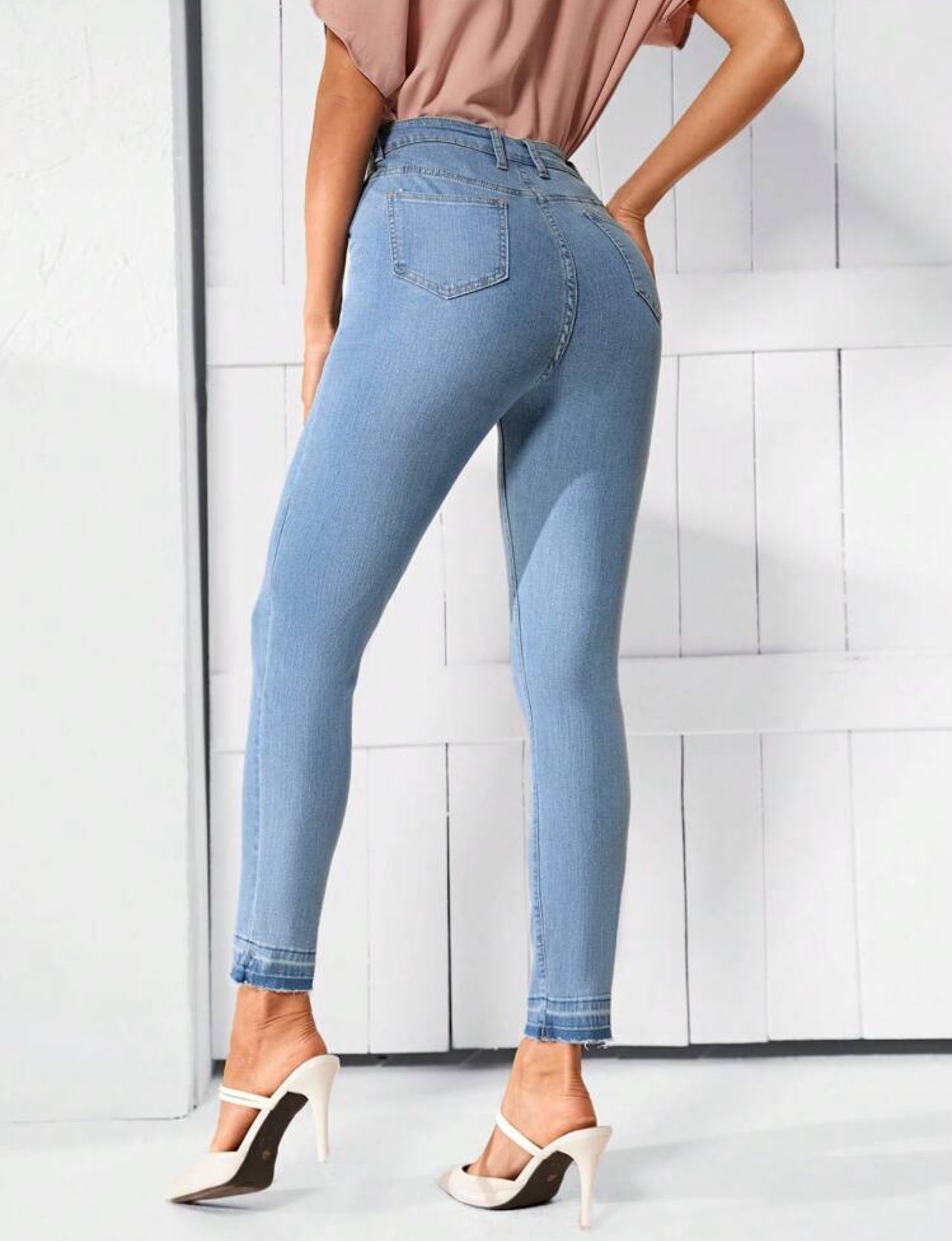 Jeans skinny avec taille haute et poches