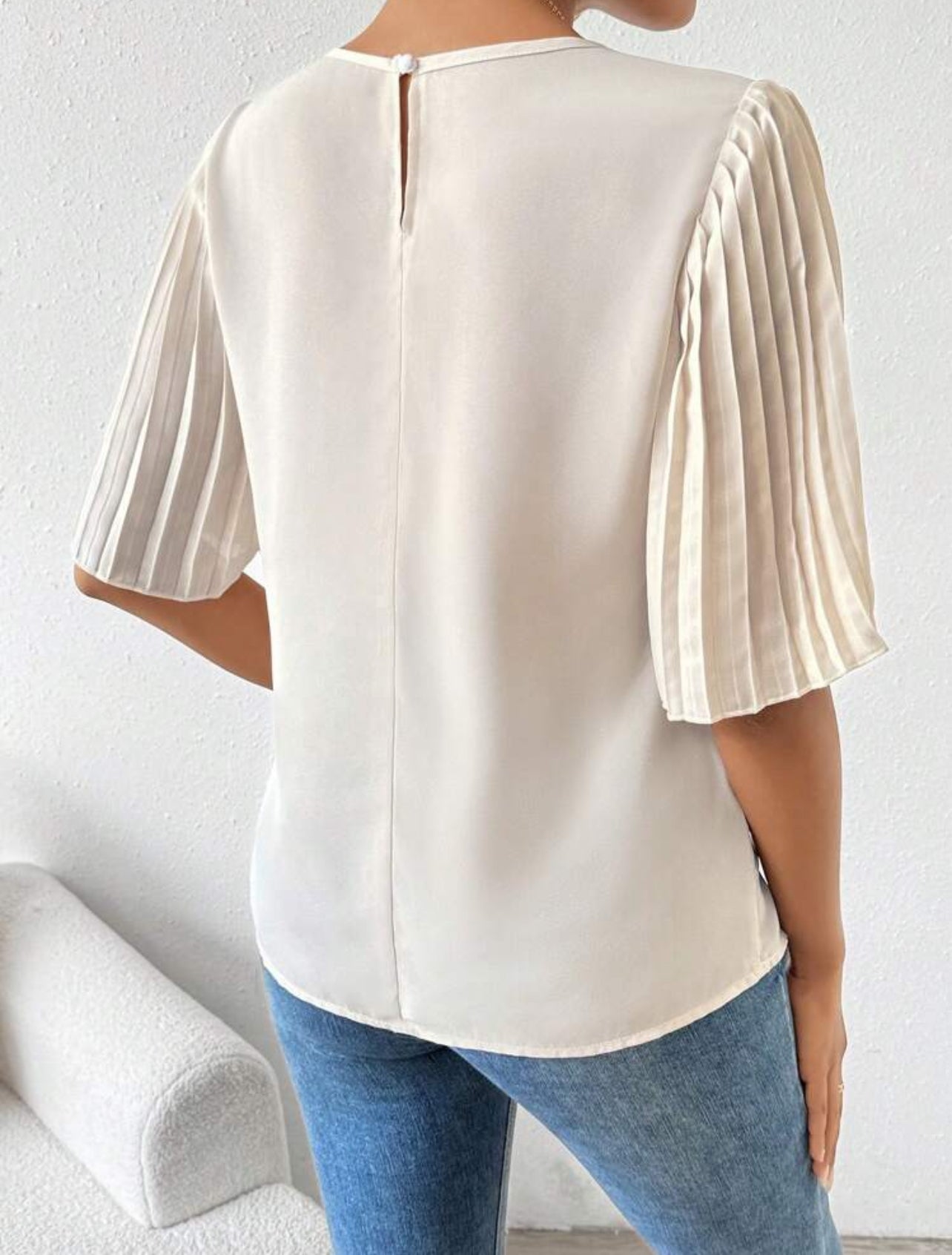 Blouse avec manches plissées et col rond