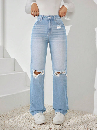 Jeans mom con strappo