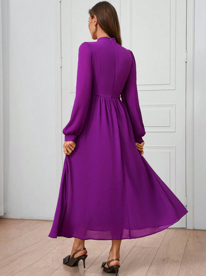 Robe longue et élégante avec manches bouffantes