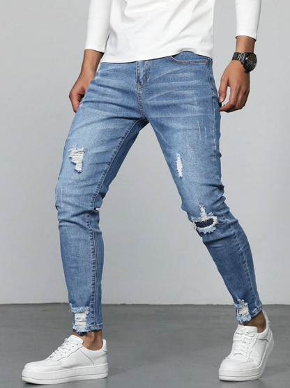 Jeans slim homme avec déchirures