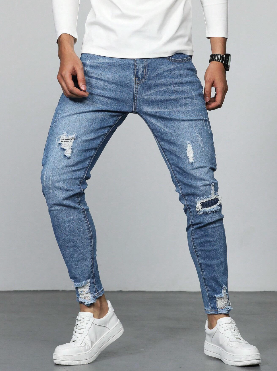 Jeans slim homme avec déchirures