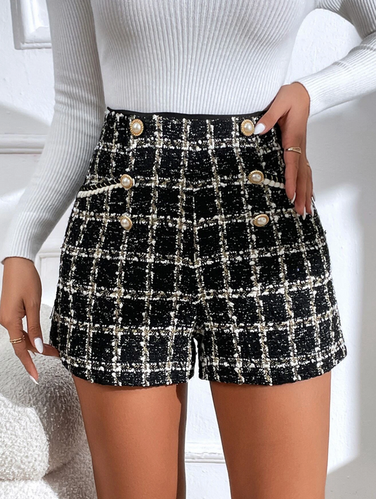 Shorts in tweed con motivo check