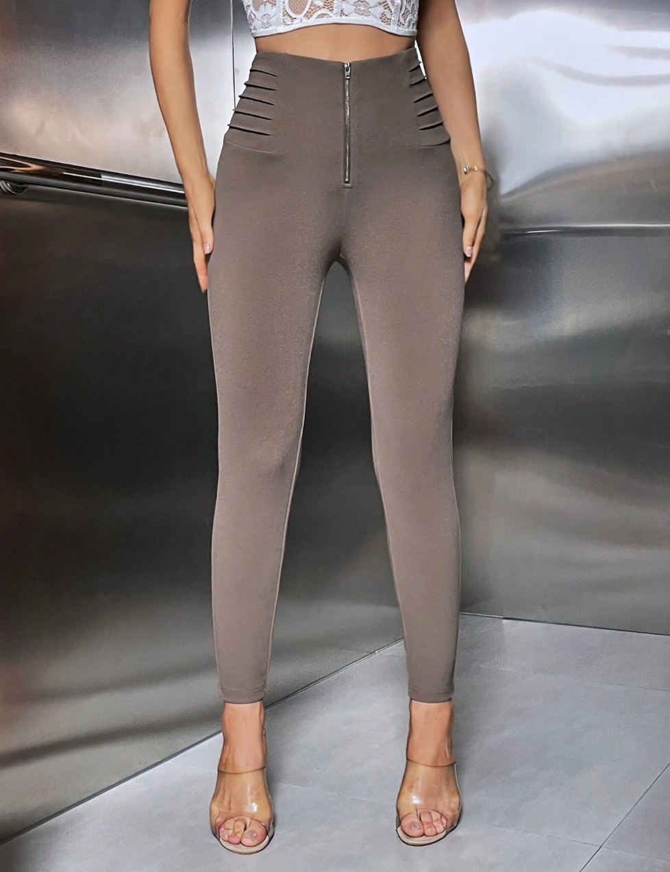 Pantalon moulant avec taille haute et fermeture éclair