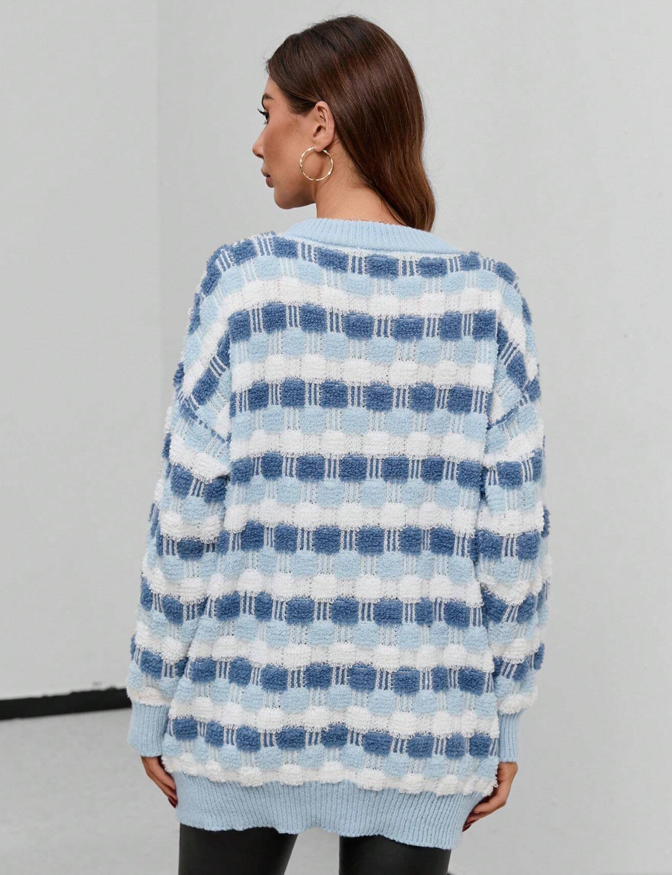 Pull élégant avec motif à carreaux