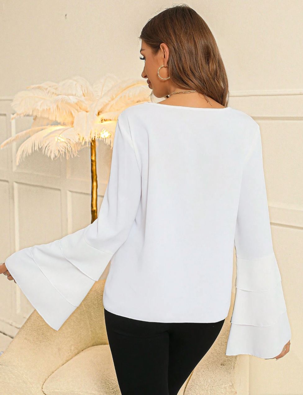 Blouse élégante avec manches évasées