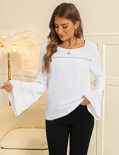 Blouse élégante avec manches évasées