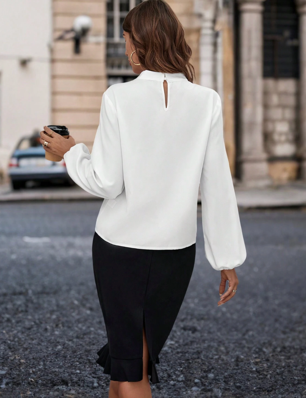 Ensemble blouse avec manches lanterne et jupe