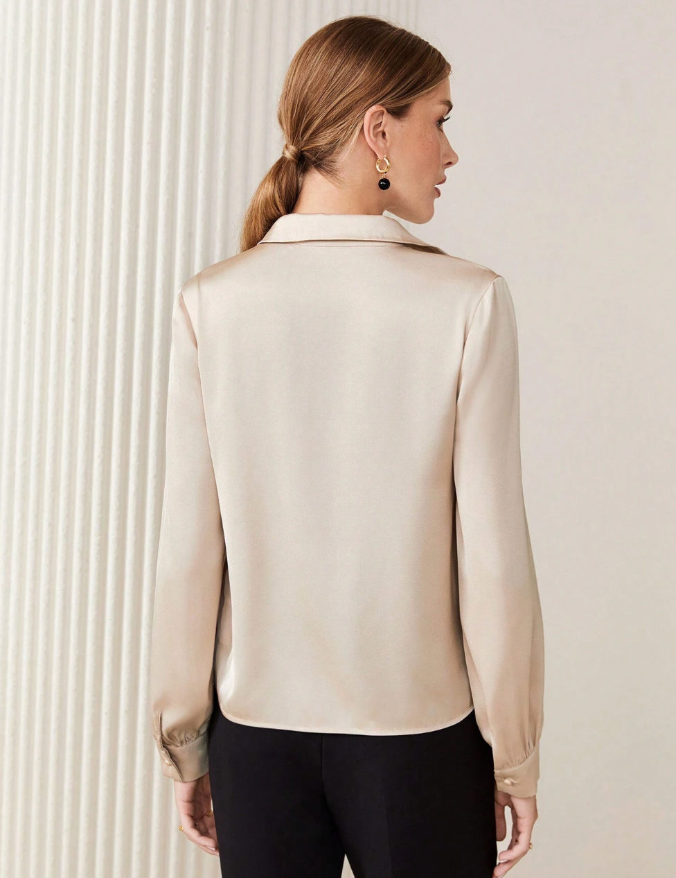 Blusa elegante con davanti a strati