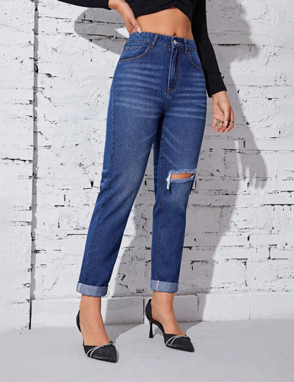 Jeans élégant avec déchirure et taille haute