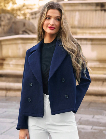 Manteau avec revers et double patte de boutonnage