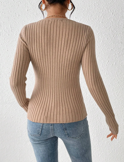 Pull en tricot côtelé avec torsade à l'avant