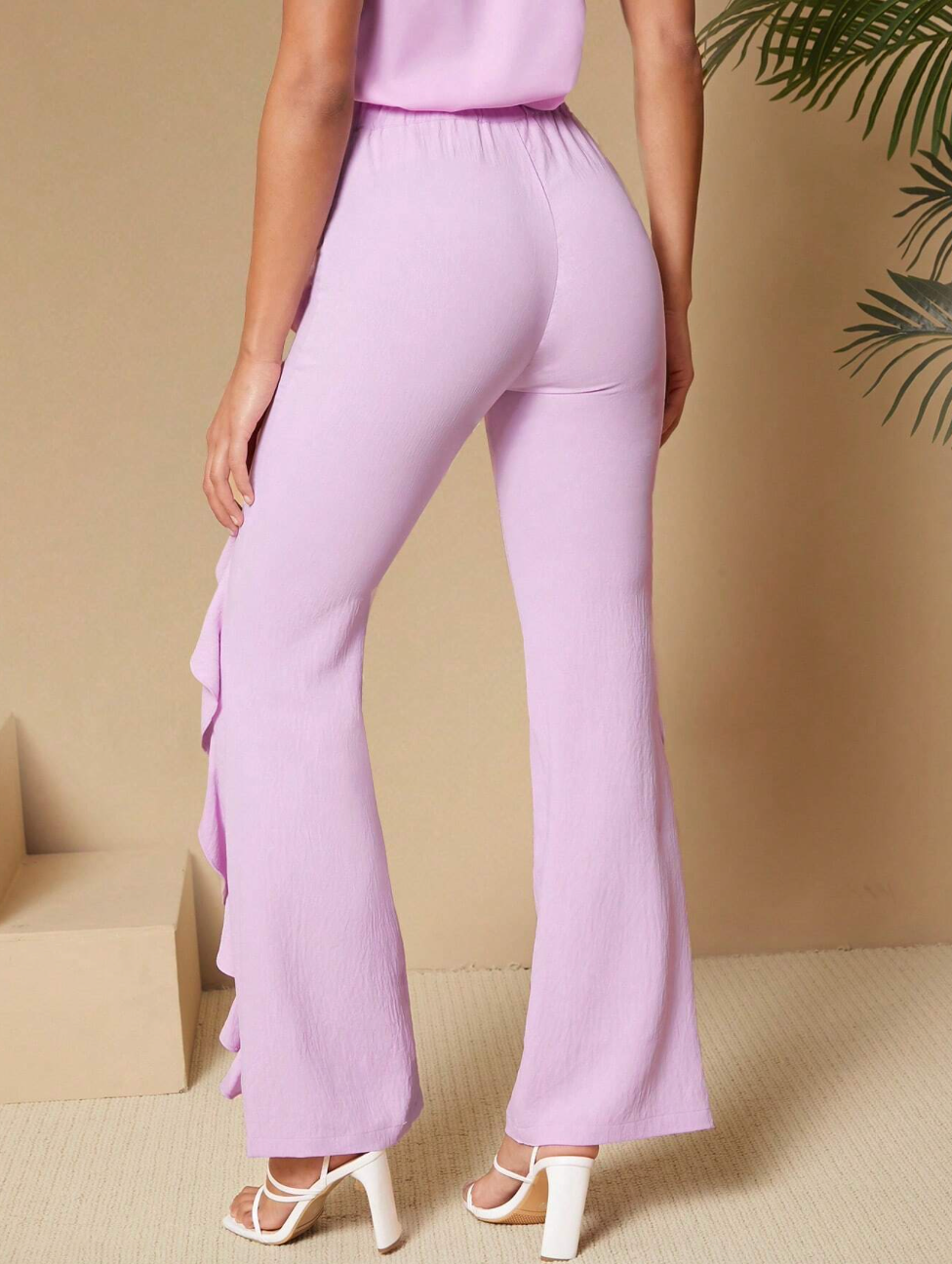 Pantalon taille haute avec détails volants