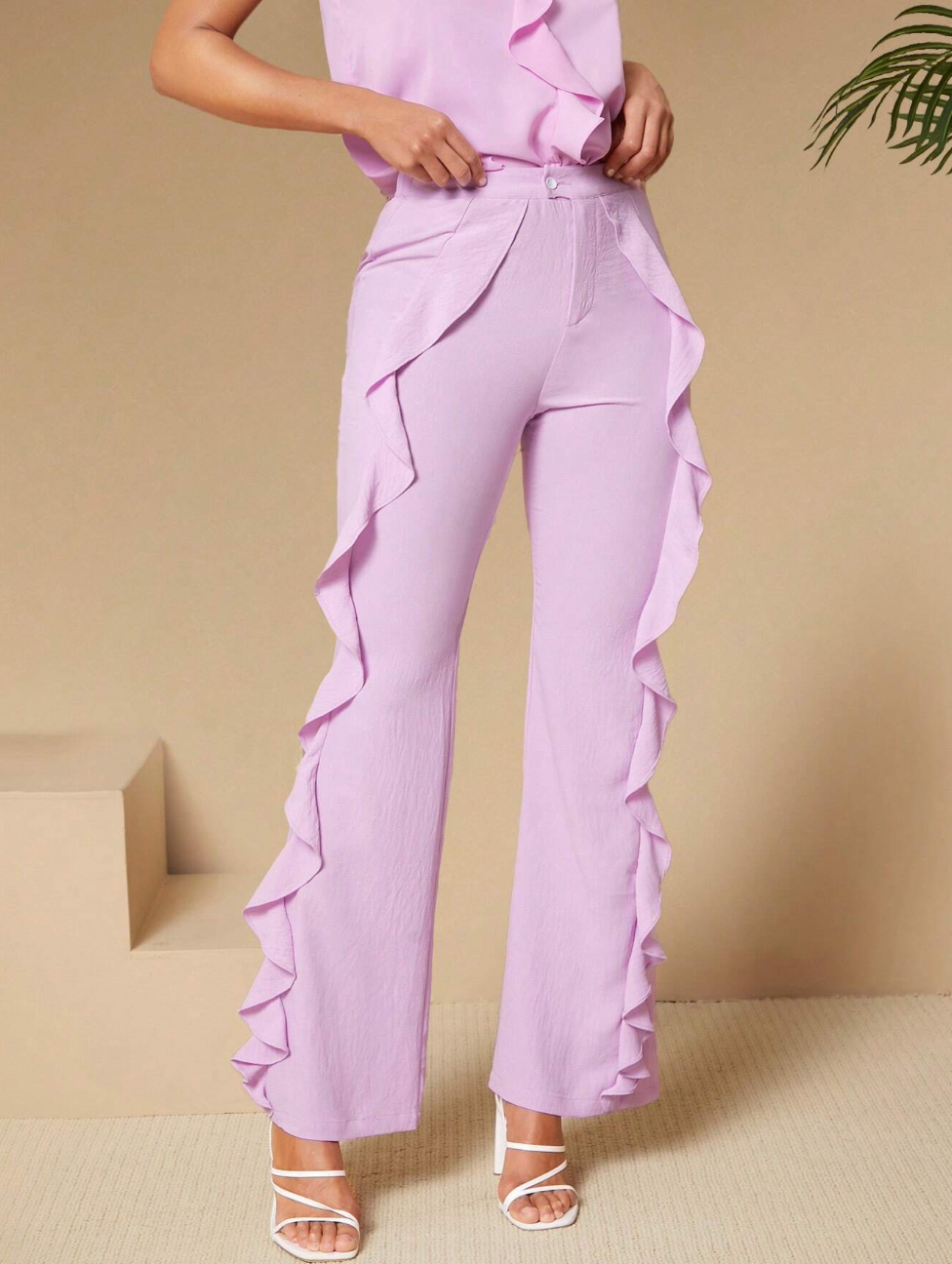 Pantalon taille haute avec détails volants