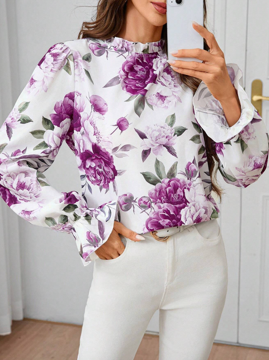 Blouse élégant avec manches longues et motif floral