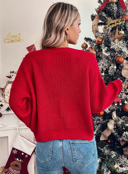 Pull élégant avec détails strass et perles