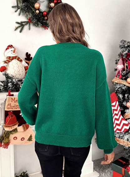 Pull de noël avec noeud papillon et paillettes