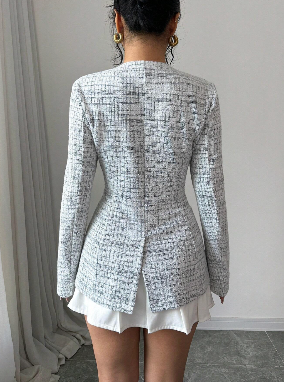 Blazer élégant en tweed avec décolleté en coeur