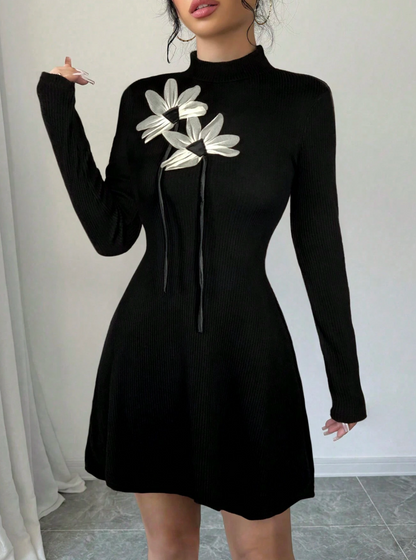 Robe pull élégante avec application florale