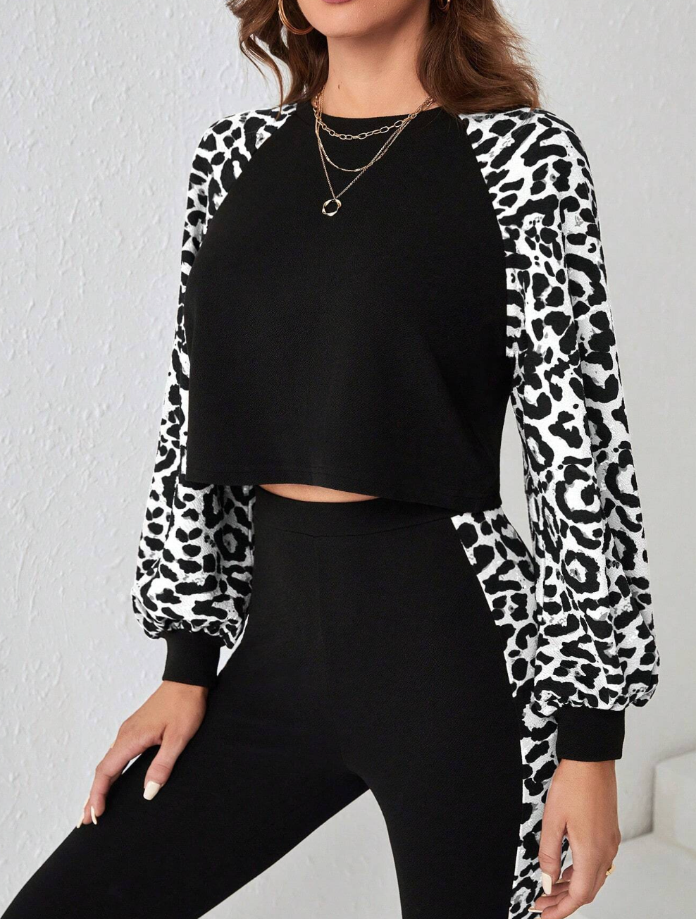 Completo maglione con motivo leopardato e leggings