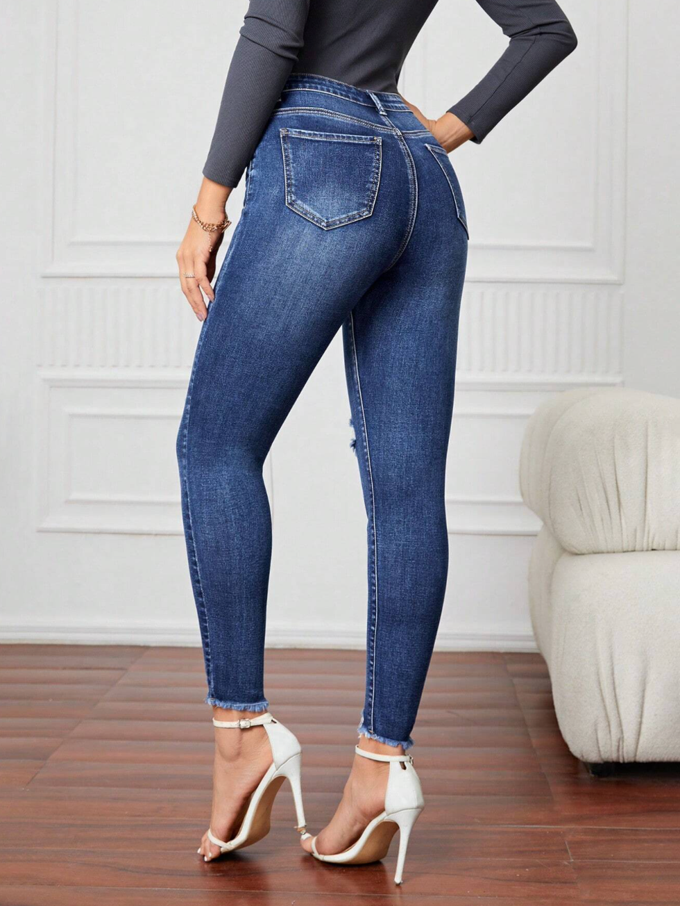 Jeans skinny troué taille haute