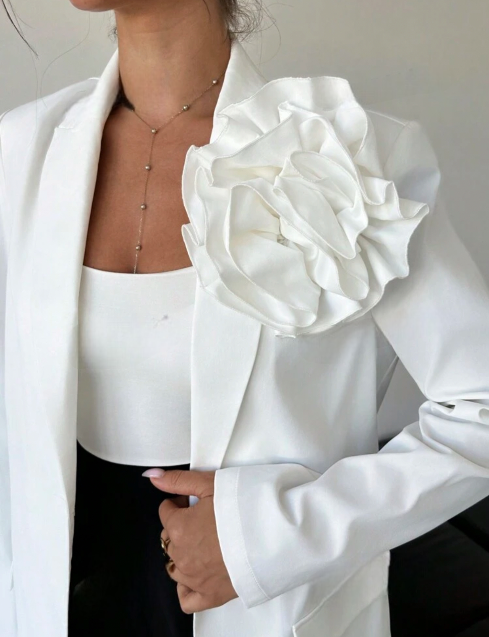 Blazer élégant avec application florale