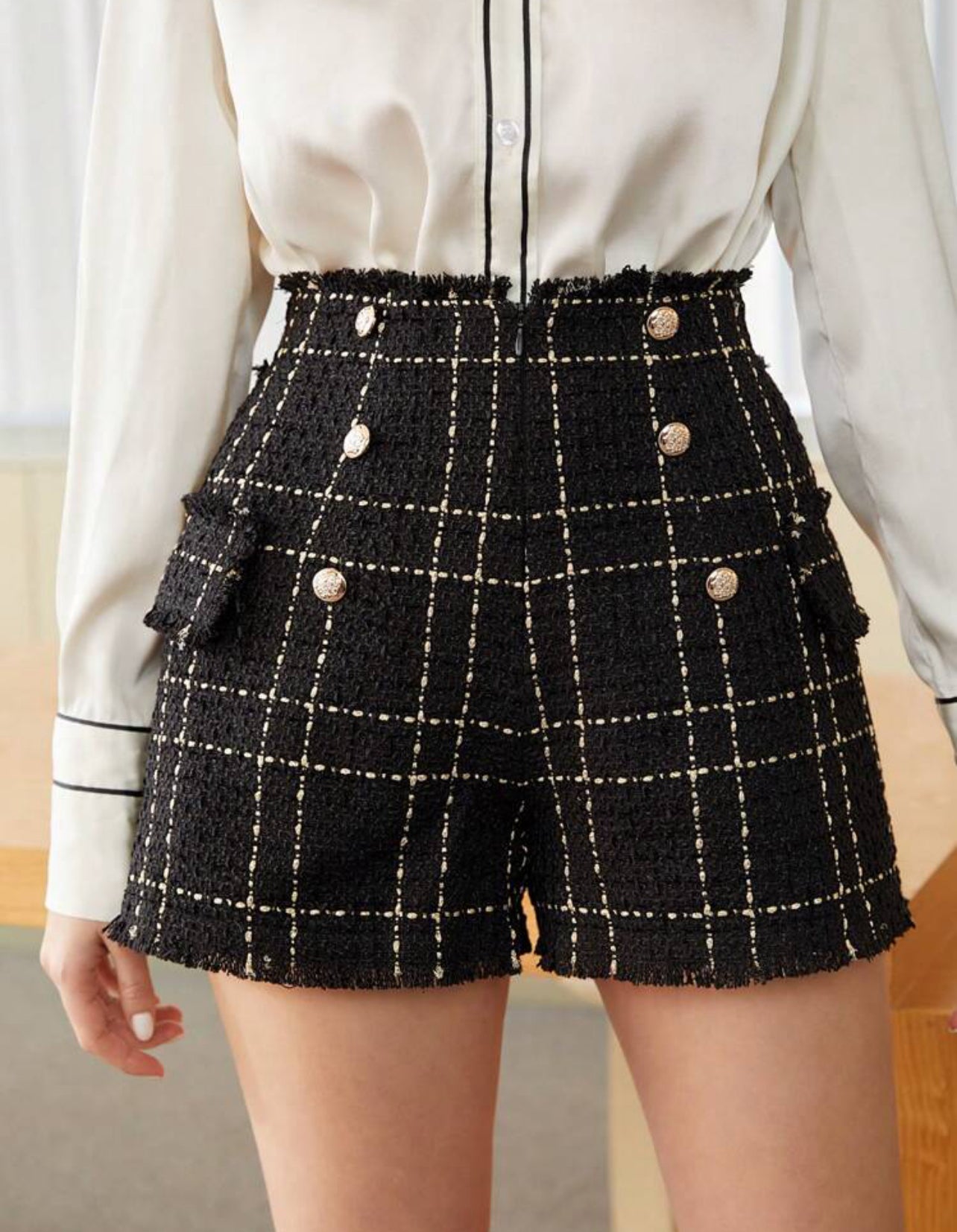 Short élégant en tweed à carreaux